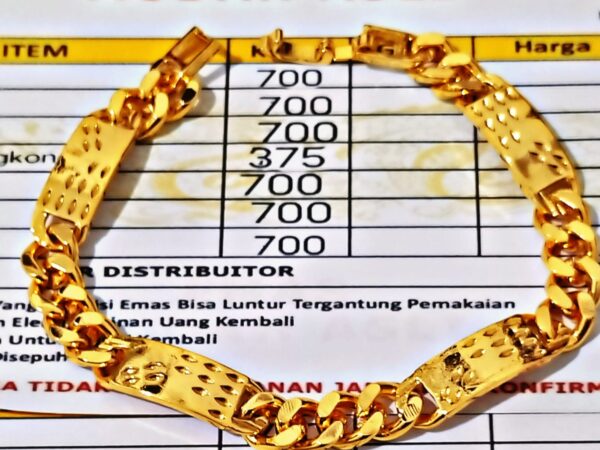 gelang emas asli berat 42grm kadar 700 dapat surat dari toko