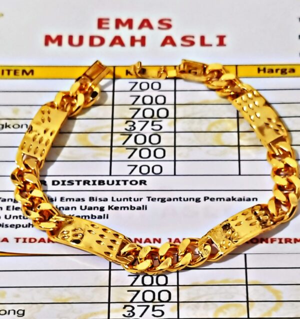 gelang emas asli berat 42grm kadar 700 dapat surat dari toko